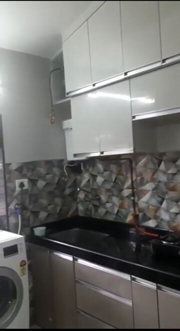 Kitchen in 1 BHK Apartment at Gokuldham CHS Goregaon, Goregaon East – for Rent