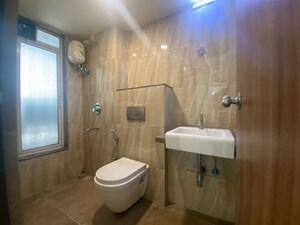 Bathroom in 1 BHK Apartment at Lodha Amara, Kolshet Road – for Rent
