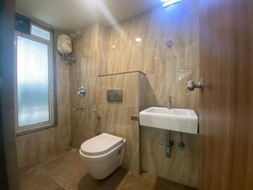 Bathroom in 1 BHK Apartment at Lodha Amara, Kolshet Road – for Rent
