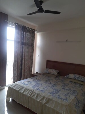 Bedroom in 3 BHK Apartment at Ansal API Celebrity Gardens, Sushant Golf City – for Rent