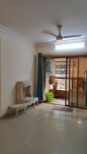 Living Room in 2 BHK Apartment at Regency Estate, Dombivli East – for Sale