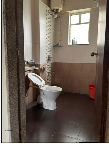 Bathroom in 1 BHK Apartment at Gulmohar Symphony, Kharadi – for Rent