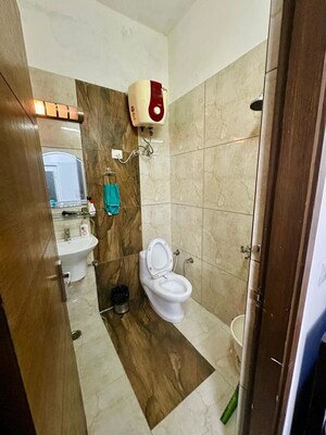 Bathroom in 3 BHK Apartment at Windsor Paradise 2, Raj Nagar Extension – for Rent
