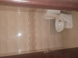 Bathroom in 2 BHK Apartment at Proview Officer City 2, Raj Nagar Extension – for Rent