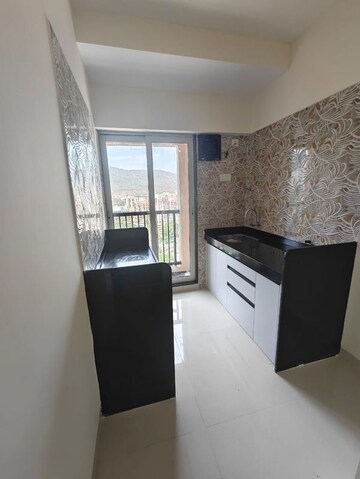 Kitchen in 1 BHK Apartment at Raunak Residency Thane, Pokhran Road No One – for Sale