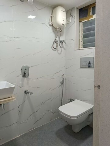 Bathroom in 2 BHK Apartment at Chandak Cornerstone, Worli – for Rent