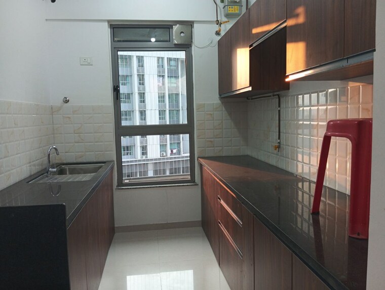Kitchen, kalpataru-immensa 2 Bedroom 599 Sq.Ft. Apartment In Kolshet Road Thane 9985285