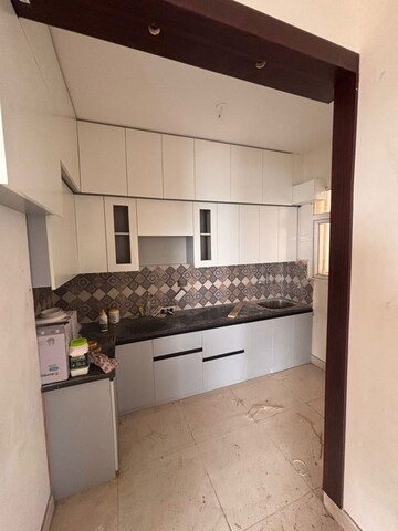 Kitchen in 2 BHK Apartment at Signature The Millennia 3, Sector 37d – for Rent