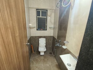 Bathroom in 1 RK Apartment at Buttepatil Gulab Heights, Shivajinagar – for Rent