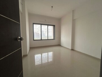 Bedroom in 2 BHK Apartment at Shree Niketan, Kandivali West – for Sale