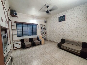 Living Room in 1 BHK Apartment at Nimbaj Nagar CHS, Anand Nagar – for Rent