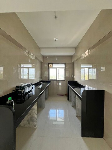 Kitchen in 3 BHK Apartment at Tirumala Habitats, Mulund West – for Rent