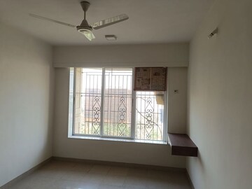 Room in 2 BHK Apartment at Serenity Heights, Malad West – for Rent