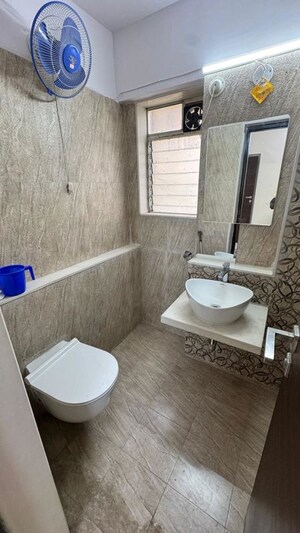 Bathroom in 1 BHK Apartment at Ajmera Arham, Malad West – for Rent