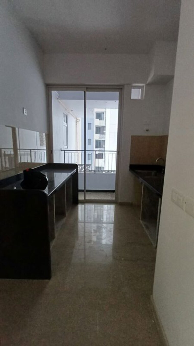 Kitchen, courtyard-by-narang-realty-and-the-wadhwa-group 2 Bedroom 830 Sq.Ft. Apartment In Pokhran Road No Two Thane 9985995