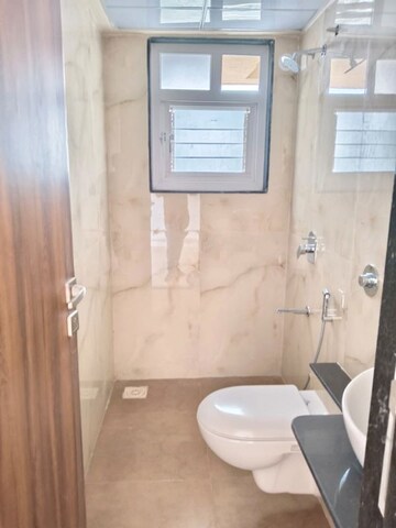Bathroom in 3 BHK Apartment at Wadhwani Om Mangalam Yash, Kiwale – for Rent