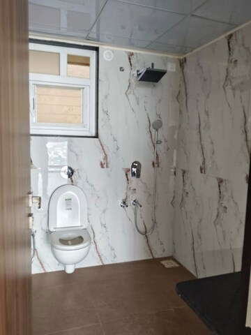 Bathroom in 3 BHK Apartment at Wadhwani Om Mangalam Yash, Kiwale – for Rent