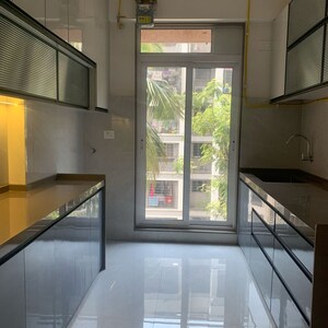 Kitchen in 3 BHK Apartment at Rander Komal Kounteya CHS, Prerna Nagar – for Sale