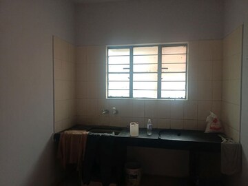 Kitchen in 2 BHK Apartment at Suyog Nisarg, Wagholi – for Sale