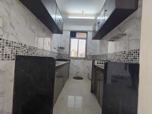 Kitchen in 2 BHK Apartment at DGS Sheetal Tapovan, Malad East – for Rent