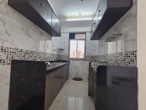 Kitchen in 2 BHK Apartment at DGS Sheetal Tapovan, Malad East – for Rent
