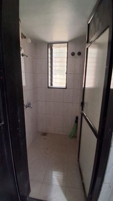 Bathroom in 3 BHK Apartment at Raheja Township, Malad East – for Rent