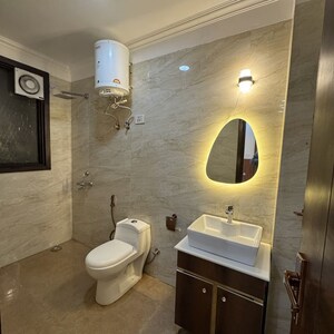 Bathroom in 2 BHK Builder Floor at Chattarpur – for Sale