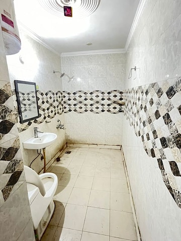 Bathroom in 4 BHK Apartment at RWA Apartments Sector 12, Sector 12 – for Rent
