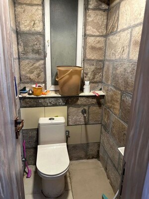 Bathroom in 3 BHK Apartment at Orchid Petals, Sector 49 – for Sale