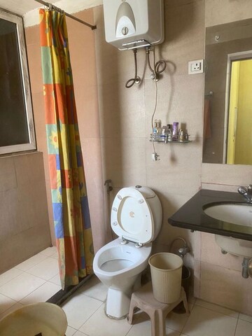 Bathroom in 4 BHK Apartment at Orchid Petals, Sector 49 – for Sale
