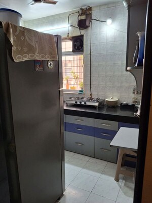 Kitchen in 3 BHK Apartment at Kailash Manas Apartments, Mohammadwadi – for Sale