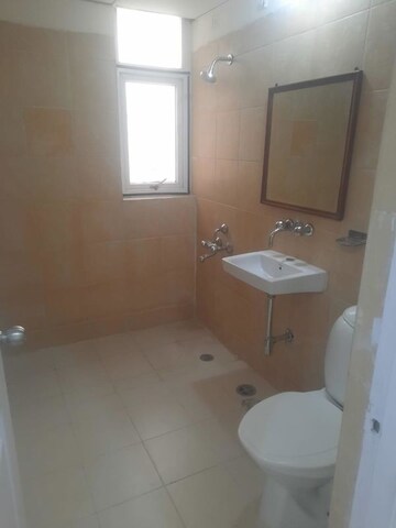 Bathroom in 5 BHK Apartment at Orchid Petals, Sector 49 – for Sale