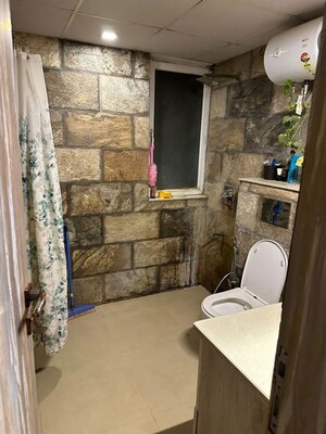 Bathroom in 4 BHK Apartment at Orchid Petals, Sector 49 – for Rent