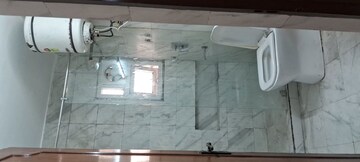 Bathroom in 3 BHK Apartment at Sarita Vihar – for Rent