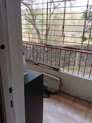 Balcony in 2 BHK Apartment at Patil Raghukul Nagari CHS, Bopodi – for Rent