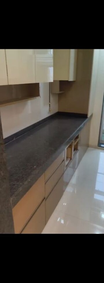 Kitchen in 2 BHK Apartment at Rustomjee Urbania Aurelia, Thane West – for Rent