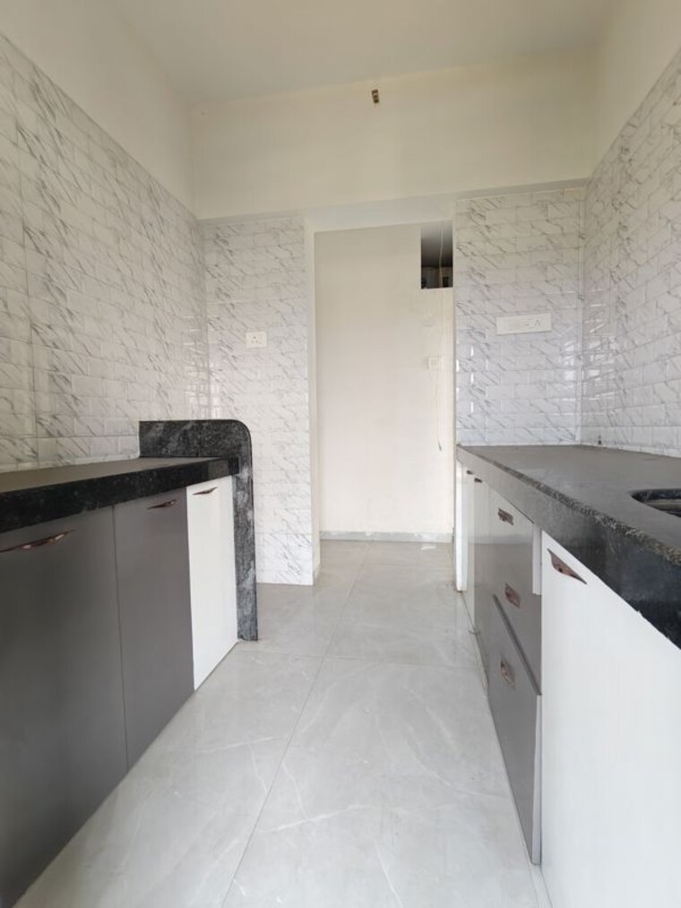 Kitchen, shree-ostwal-horizon 1 Bedroom 645 Sq.Ft. Apartment In Mira Road Thane 9986340