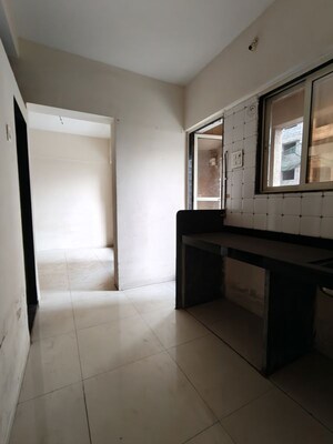 Kitchen in 1 BHK Apartment at Seven Eleven Apna Ghar II, Mira Road – for Sale