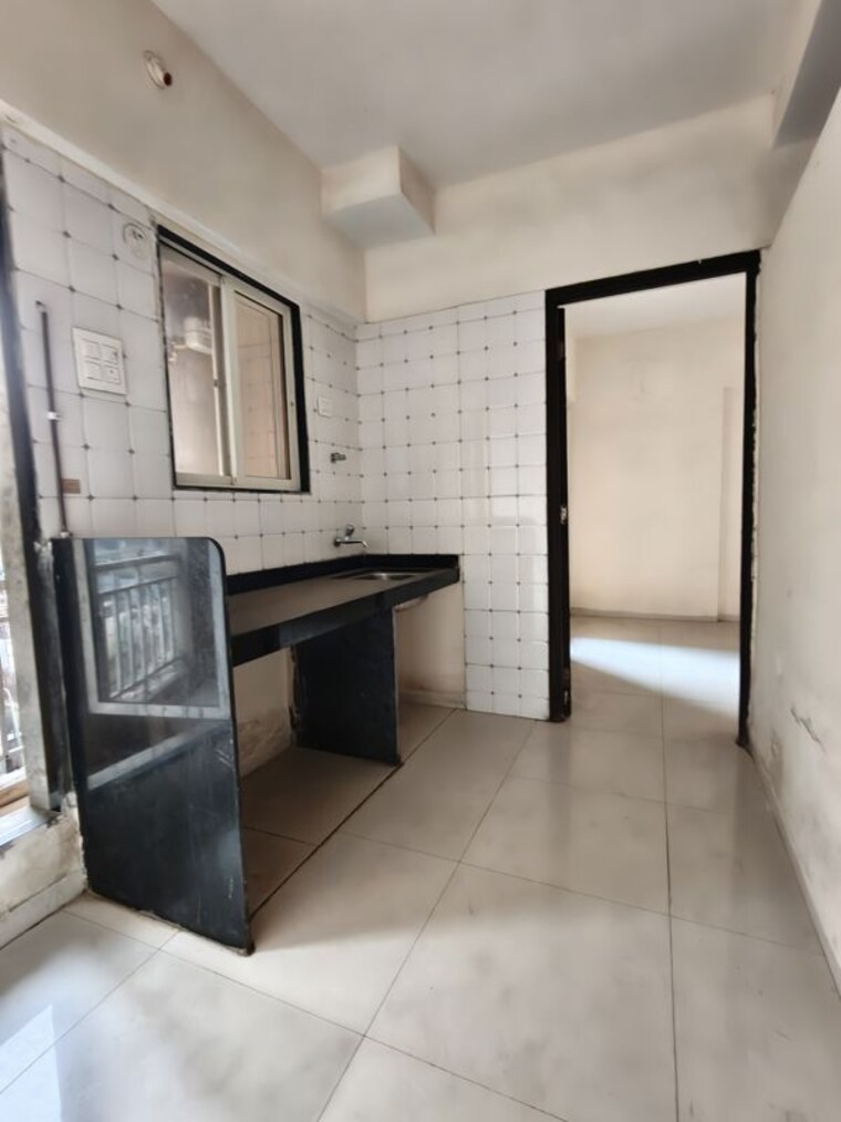 Kitchen, seven-eleven-apna-ghar-ii 1 Bedroom 575 Sq.Ft. Apartment In Mira Road Thane 9986348