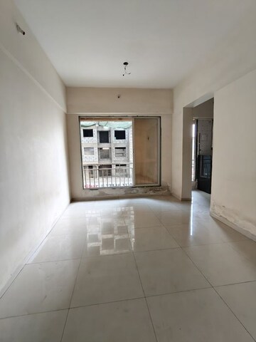 Living Room in 1 BHK Apartment at Seven Eleven Apna Ghar II, Mira Road – for Sale