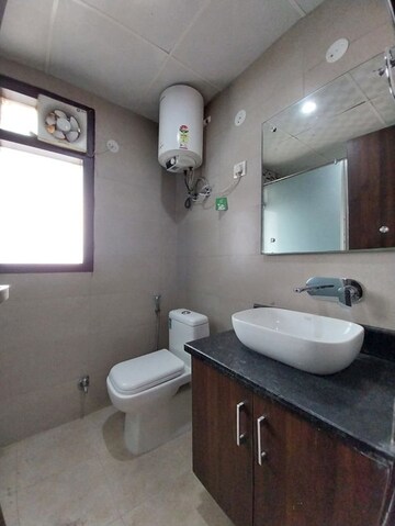 Bathroom in 4 BHK Builder Floor at Ansal API Esencia, Sector 67 – for Sale