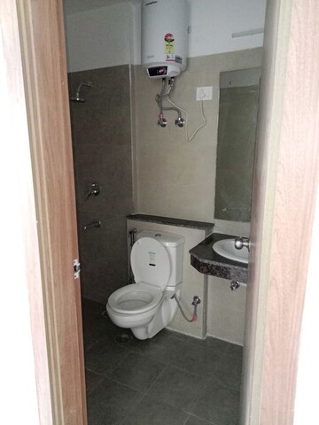Bathroom in 3 BHK Apartment at ATS Homekraft Pious Hideaways, Sector 150 – for Rent