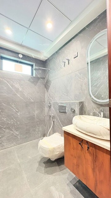 Bathroom in 4 BHK Builder Floor at Ansal API Esencia, Sector 67 – for Sale