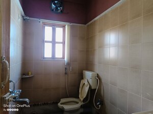 Bathroom in 2 BHK Apartment at Sristi Plaza, Chinar Park – for Rent