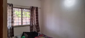 Bedroom in 1 RK Apartment at Koregaon Park – for Rent