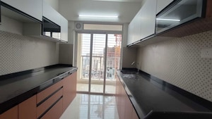 Kitchen in 3 BHK Apartment at Lodha Splendora, Ghodbunder Road – for Rent
