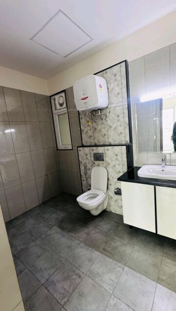 Washroom in 5 BHK Apartment at Uchdpl Veridia Oakwood Enclave, Wave City – for Sale