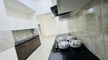 Kitchen in 5 BHK Apartment at Uchdpl Veridia Oakwood Enclave, Wave City – for Sale