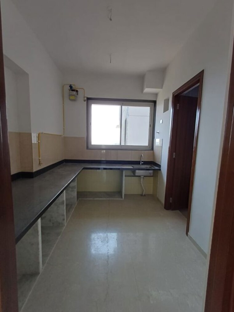 Kitchen, courtyard-by-narang-realty-and-the-wadhwa-group 3 Bedroom 1160 Sq.Ft. Apartment In Pokhran Road No Two Thane 9986544