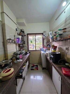 Kitchen in 3 BHK Apartment at Gemstar Nestle Apartments, Malad West – for Rent